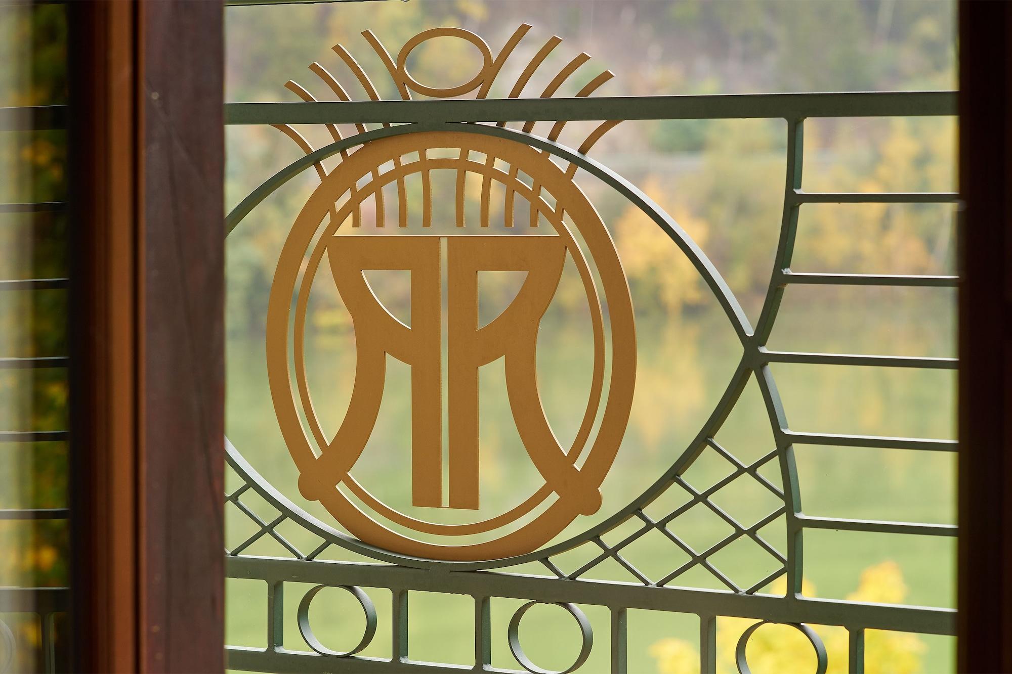 Retro Riverside Wellness Resort Karlsbad Buitenkant foto The logo of the Swiss National Museum